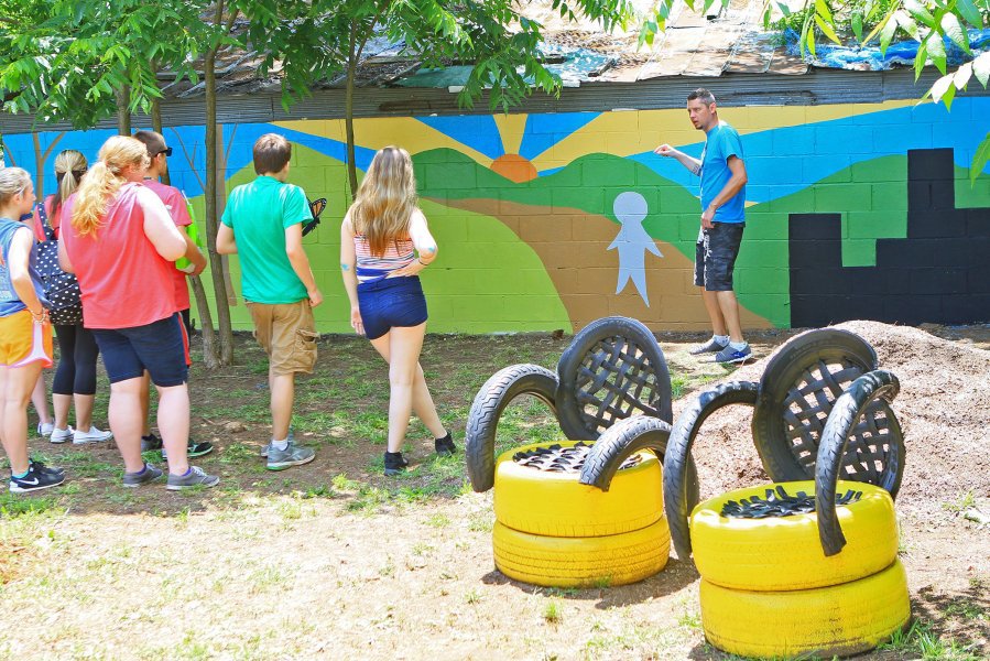Anderson students paint mural to decorate garden