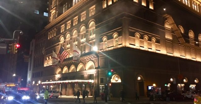 Nighttime exterior photo of New York City's Carnegie Hall.