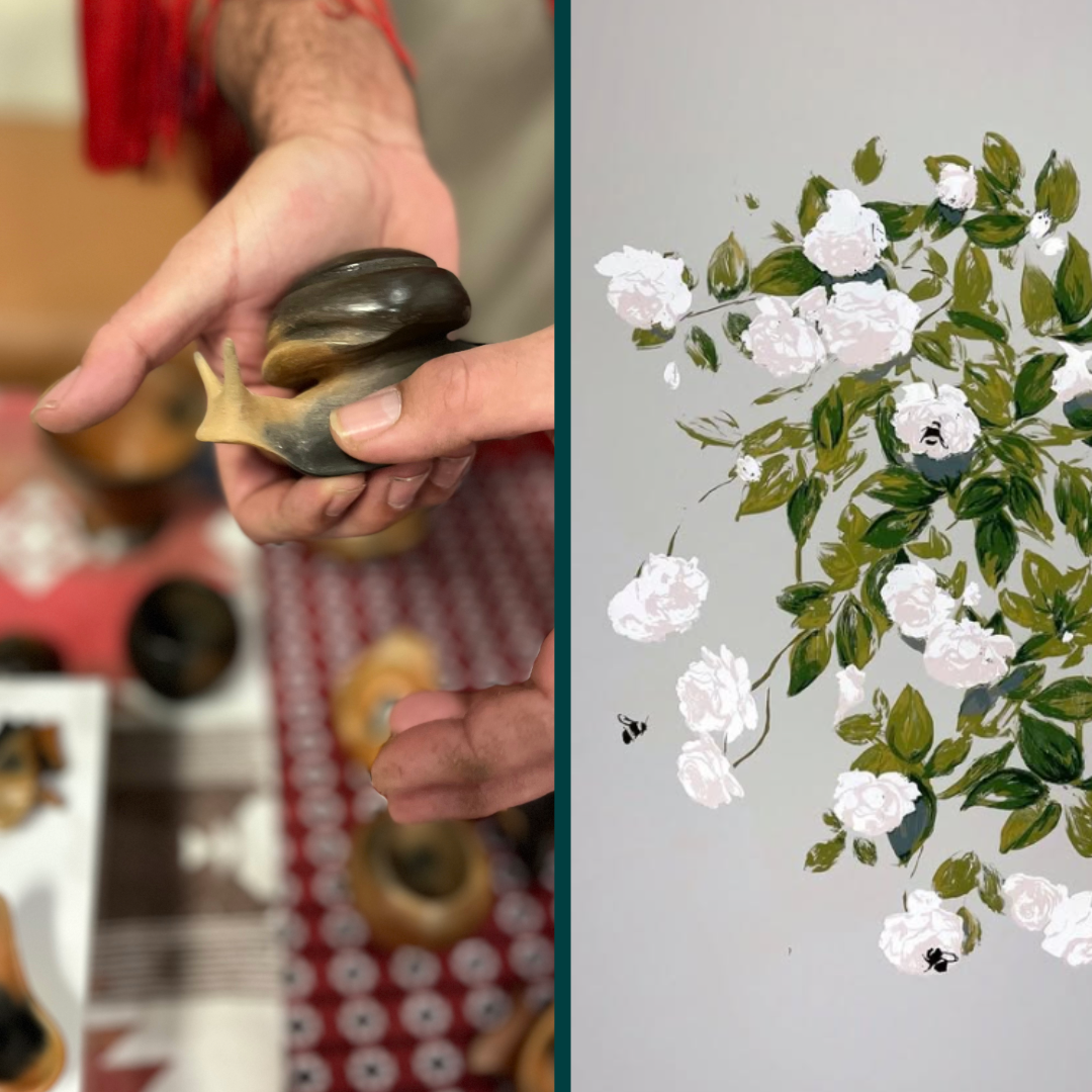 A pottery snail effigy and a painting of white flowers with green leaves.