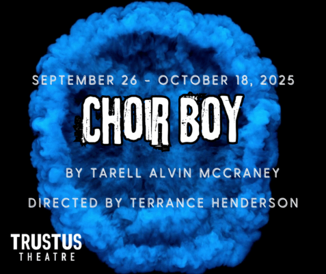 A circular shape of blue smoke against a black background.