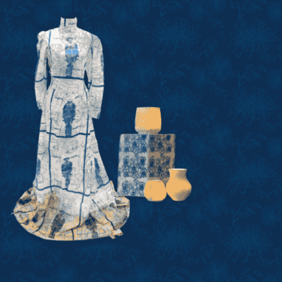 A white prairie dress printed with blue cyanotype figures. Orange porcelain vases.
