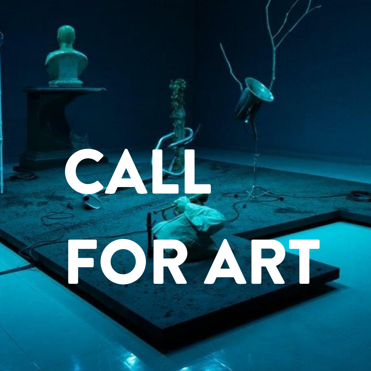 A darkly lit blue room contains work from Michael Webster's installation, Sonic Fictions.