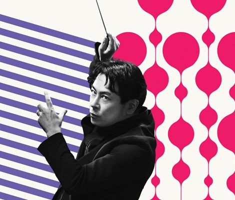 An Asian man gestures with a conductor's baton.