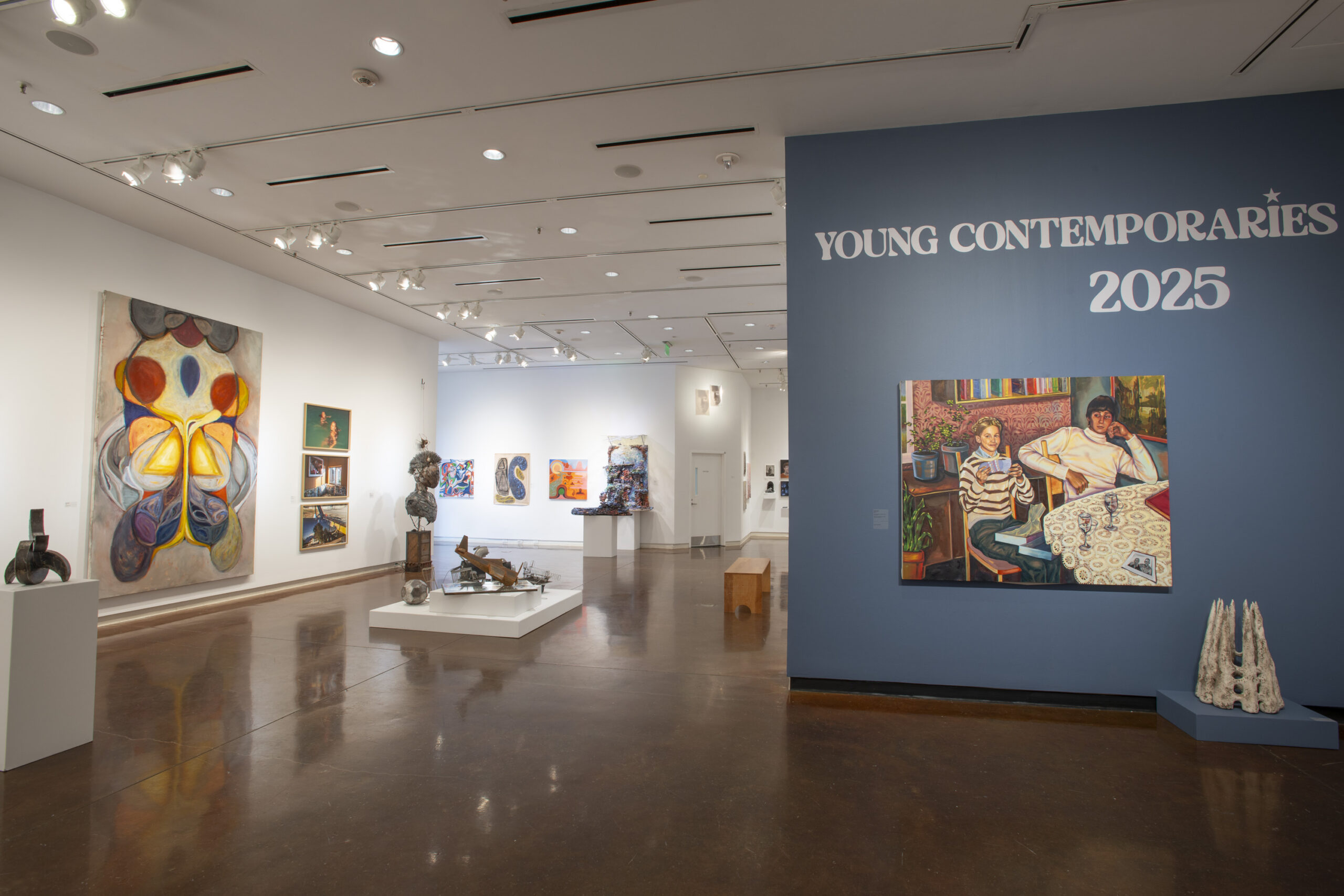2- and 3-dimensional artworks displayed in a gallery. One wall reads, "Young Contemporaries 2025."