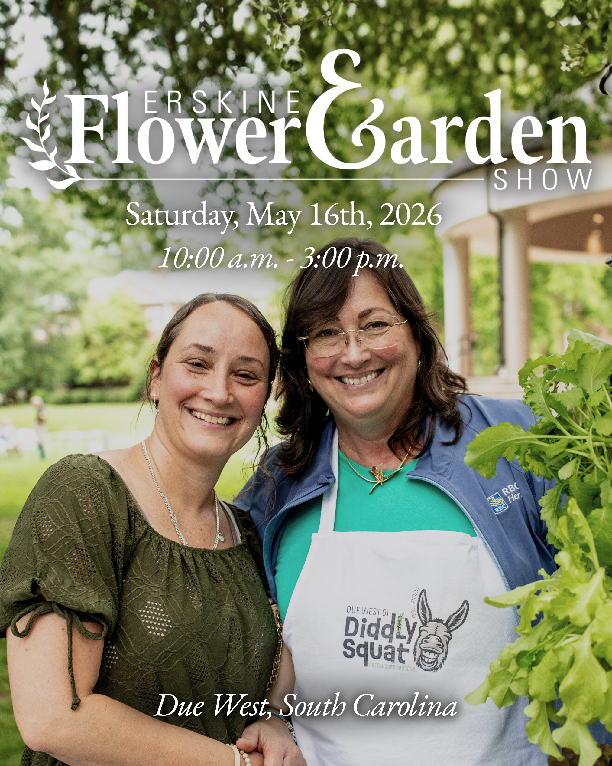 Two smiling women in garden.