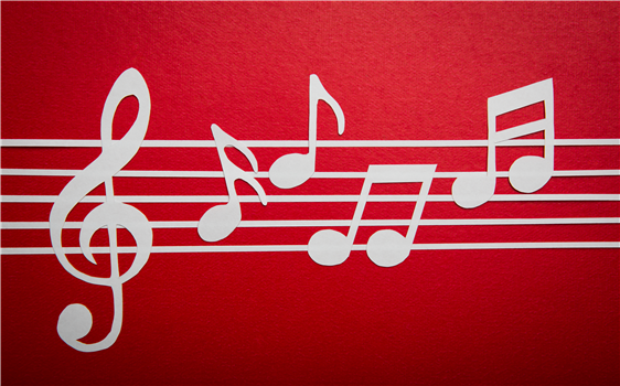 White musical notes on a red background.