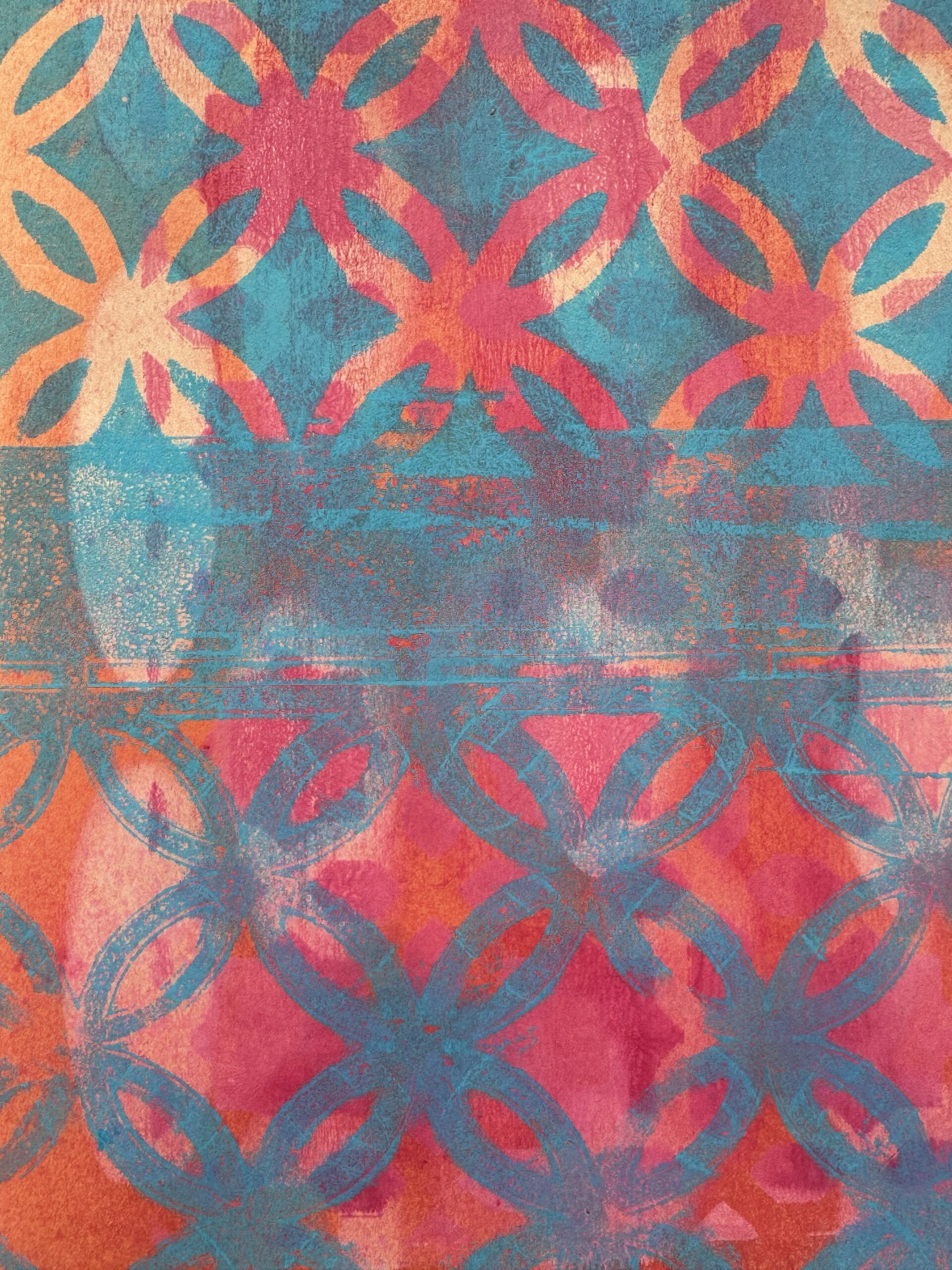 Geometric patterns repeat in orange, red, teal, and purple.