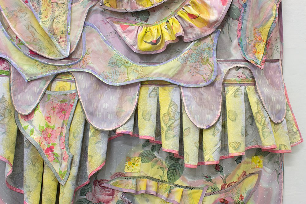 A detail of Maria Britton's artwork entitled REST NOTE, with layered and plated bedsheets.
