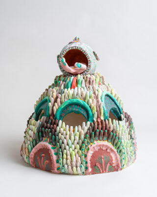 A ceramic artwork that looks knitted.