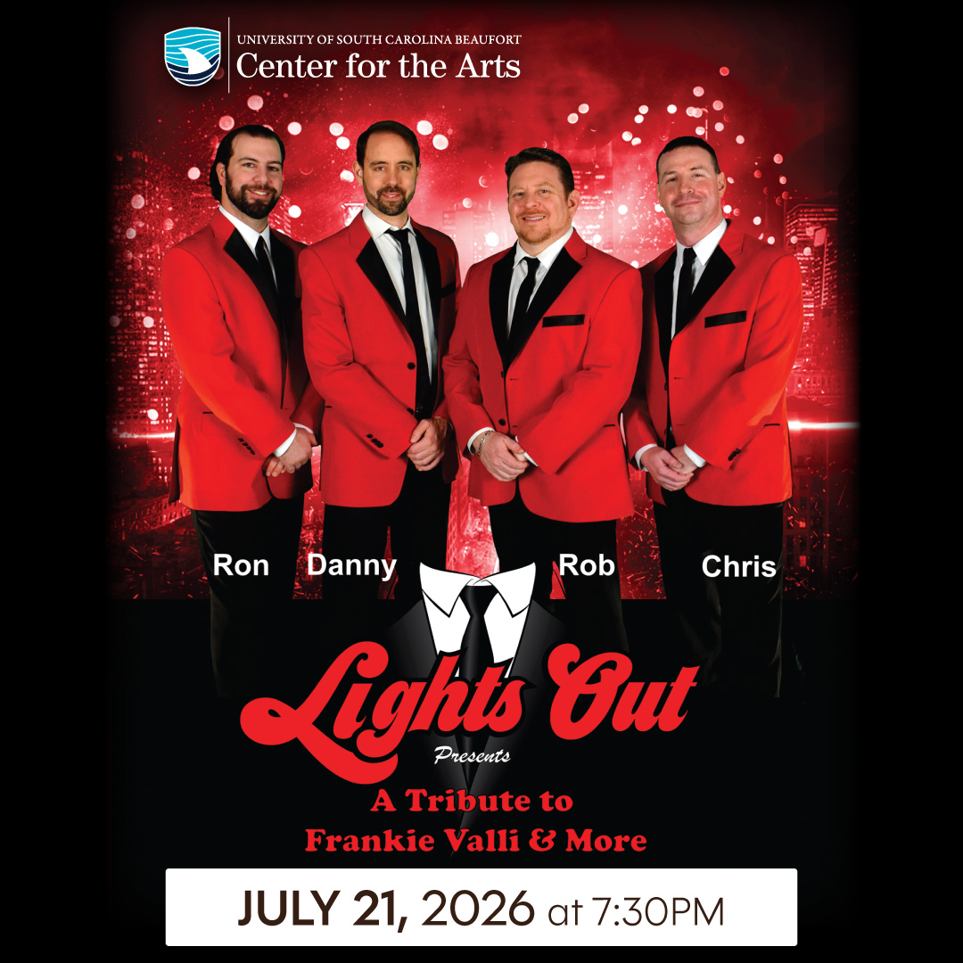 Four smiling men in red suit jackets, black ties, and black pants, against a red glitter background.
