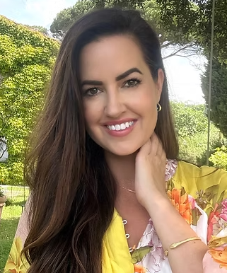 Headshot of Brooke Barlow, a white woman with long, dark hair.