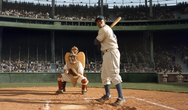 Chadwick Boseman as Jackie Robinson in "42"