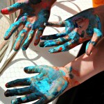 Hands of Painting Table participants